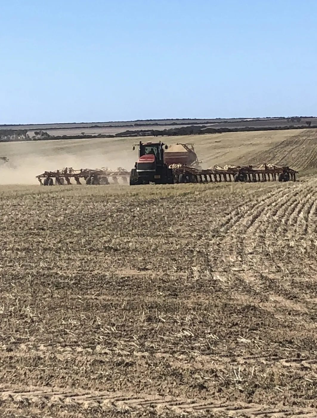 Case IH tractor pulling a seeding rig, tuned by Southern Diesel Tuning